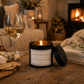 Black tin candle with the word be as picky with your men as you are with your selfies on it in a cosy cottage environment