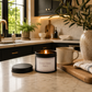 Good Vibes Only luxury candle displayed in a modern designer kitchen with elegant styling.