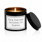 Luxury black soy wax candle with the words "Fuck This Shit, I'm Going to Narnia" on a white background with the black lid resting beside the candle.