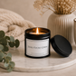 Luxury soy wax candle on a marble tray with eucalyptus, dried flowers and soft neutral décor, creating a peaceful spa-inspired atmosphere.