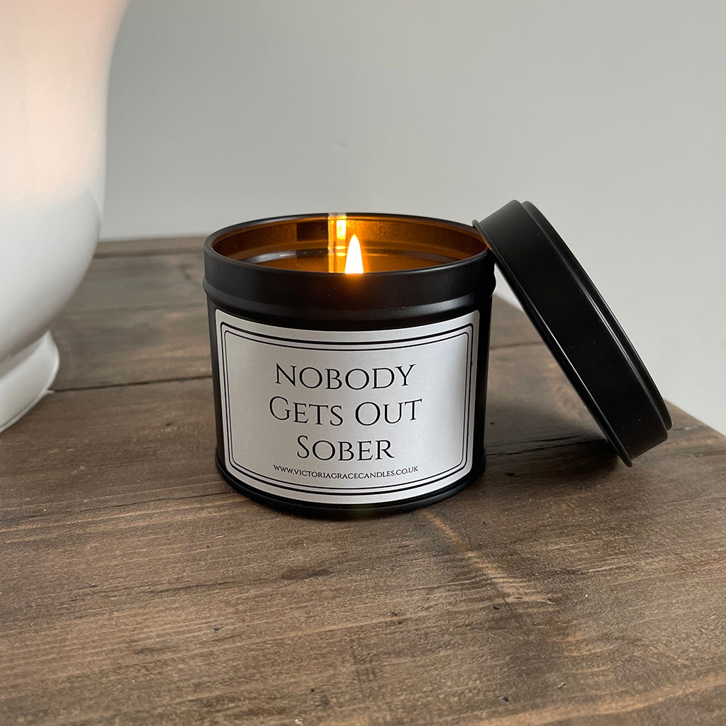 nobody gets out sober candle